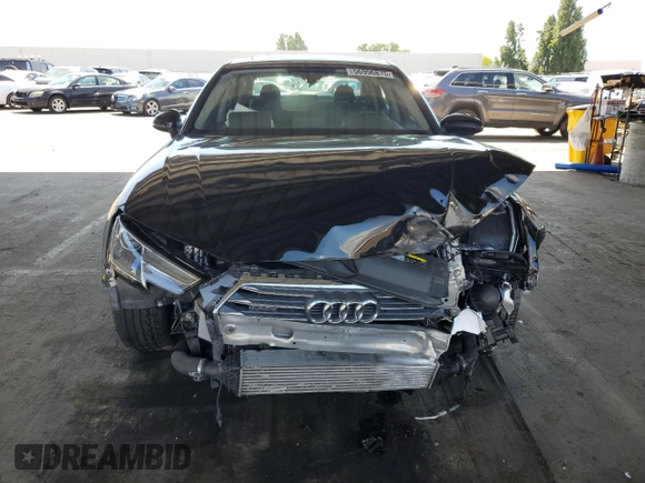2018 Audi A4 Premium with VIN WAUDNAF45JN009698, listed as a Copart auction lot 56996875 with 39,134 mi miles and Salvage title. Bid and sale history available at DreamBid. Image 5.
