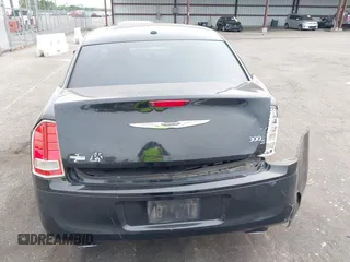 2013 Chrysler 300 with VIN 2C3CCABT2DH735764, listed as a IAAI auction lot 41977616 with 164,517 mi miles. Bid and sale history available at carsss.com. Image 16.