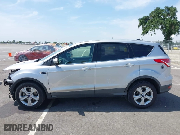 2015 Ford Escape SE with VIN 1FMCU9G93FUA26339, listed as a IAAI auction lot 42039281 with 185,729 mi miles and . Bid and sale history available at DreamBid. Image 15.