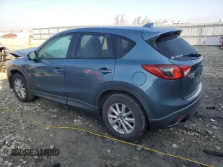 2015 Mazda CX-5 Touring with VIN JM3KE4CY0F0446748, listed as a Copart auction lot 51924585 with 111,402 mi miles and Clean Title. Bid and sale history available at DreamBid. Image 2.