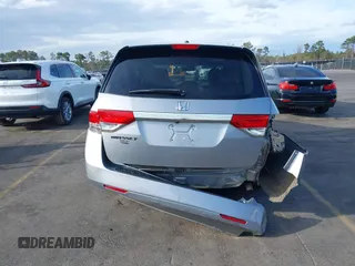 2017 Honda Odyssey EX-L with VIN 5FNRL5H64HB017661, listed as a IAAI auction lot 41719447 with 99,895 mi miles and . Bid and sale history available at DreamBid. Image 16.
