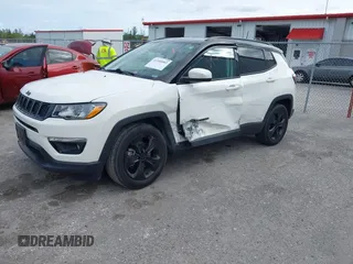 2018 Jeep Compass Latitude with VIN 3C4NJCBB1JT408465, listed as a IAAI auction lot 41350902 with 79,565 mi miles and . Bid and sale history available at DreamBid. Image 2.
