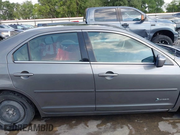 2010 Ford Fusion Hybrid with VIN 3FADP0L32AR342981, listed as a IAAI auction lot 42062235 with 287,126 mi miles. Bid and sale history available at carsss.com. Image 14.