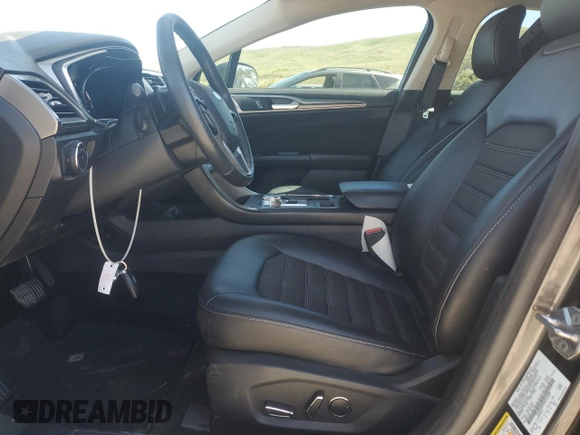 2017 Ford Fusion SE with VIN 3FA6P0H94HR142409, listed as a Copart auction lot 58325775 with 64,462 mi miles and Salvage title. Bid and sale history available at DreamBid. Image 7.