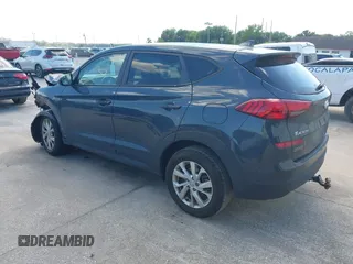 2021 Hyundai Tucson SE with VIN KM8J23A48MU379826, listed as a IAAI auction lot 41887834 with 51,885 mi miles and . Bid and sale history available at DreamBid. Image 3.