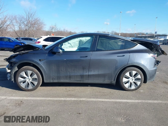 2020 Tesla Model Y Long Range with VIN 5YJYGDEE4LF030103, listed as a IAAI auction lot 41328929 with 64,896 mi miles and . Bid and sale history available at DreamBid. Image 14.