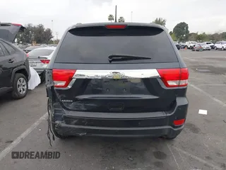 2013 Jeep Grand Cherokee Laredo with VIN 1C4RJEAGXDC620968, listed as a IAAI auction lot 41425270 with 127,739 mi miles. Bid and sale history available at carsss.com. Image 16.