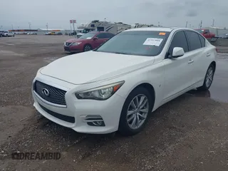 2015 Infiniti Q50 Premium z VIN JN1BV7AR6FM402481, wystawiony jako IAAI lot #41957004 z przebiegiem 171 913 mil mil oraz . Historia ofert i sprzedaży dostępna na DreamBid. Obrazek 17.