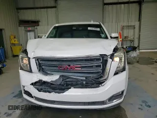 2016 GMC Yukon SLT with VIN 1GKS1BKC5GR450147, listed as a Copart auction lot 51058805 with 163,944 mi miles and Salvage Title. Bid and sale history available at carsss.com. Image 14.