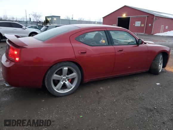 2006 Dodge Charger SRT-8 with VIN 2B3LA73W16H480803, listed as a Copart auction lot 84769274 with 110,243 mi miles and Salvage Title. Bid and sale history available at DreamBid. Image 3.