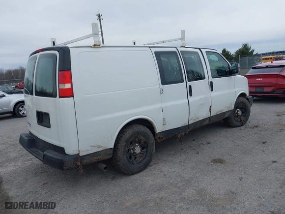 2011 Chevrolet Express Cargo Van with VIN 1GCSGAFX2B1143849, listed as a IAAI auction lot 41858628 with 104,097 mi miles. Bid and sale history available at carsss.com. Image 4.