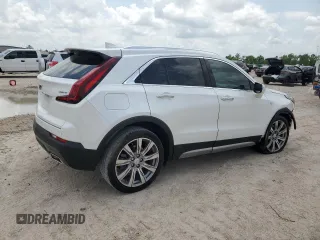 2021 Cadillac XT4 FWD Premium Luxury with VIN 1GYFZCR44MF080763, listed as a Copart auction lot 54059525 with 46,319 mi miles and Salvage Title. Bid and sale history available at carsss.com. Image 3.