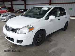 2010 Nissan Versa 1.8 S with VIN 3N1BC1AP7AL414885, listed as a IAAI auction lot 41484047 with 200,905 mi miles. Bid and sale history available at carsss.com. Image 2.