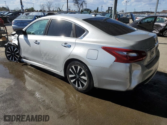 2018 Nissan Altima SV with VIN 1N4AL3AP8JC207041, listed as a Copart auction lot 51521575 with 127,482 mi miles and Salvage Title. Bid and sale history available at DreamBid. Image 2.