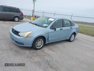 2009 Ford Focus SE with VIN 1FAHP35N59W157060, listed as a IAAI auction lot 41871757 with 141,558 mi miles. Bid and sale history available at carsss.com. Image 2.