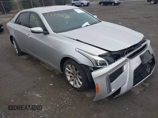 2014 Cadillac CTS AWD z VIN 1G6AW5SX6E0126805, wystawiony jako IAAI lot #41947488 z przebiegiem 110 651 mil mil oraz . Historia ofert i sprzedaży dostępna na DreamBid. Obrazek 1.