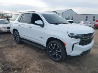 2021 Chevrolet Tahoe RST with VIN 1GNSKRKD8MR437213, listed as a IAAI auction lot 41827870 with 47,169 mi miles. Bid and sale history available at carsss.com. Image 1.
