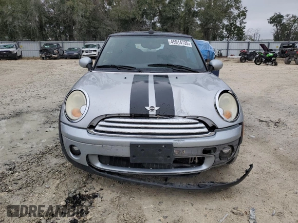 2009 MINI Convertible с VIN WMWMR33579TU95581, выставлен на аукционе Copart как лот 45914735 с пробегом 129 790 миль миль и Списание • Salvage title. История ставок и продаж доступна на DreamBid. Изображение 5.