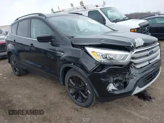 2017 Ford Escape SE with VIN 1FMCU0GD2HUD09575, listed as a IAAI auction lot 41952349 with 62,886 mi miles and . Bid and sale history available at DreamBid. Image 1.