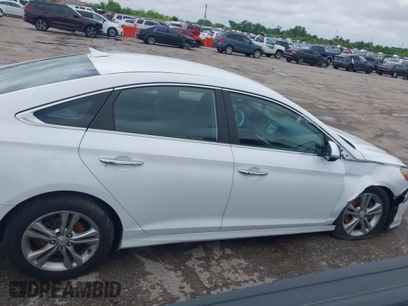 2018 Hyundai Sonata SEL with VIN 5NPE34AF8JH598317, listed as a IAAI auction lot 42214605 with 106,939 mi miles and . Bid and sale history available at carsss.com. Image 13.
