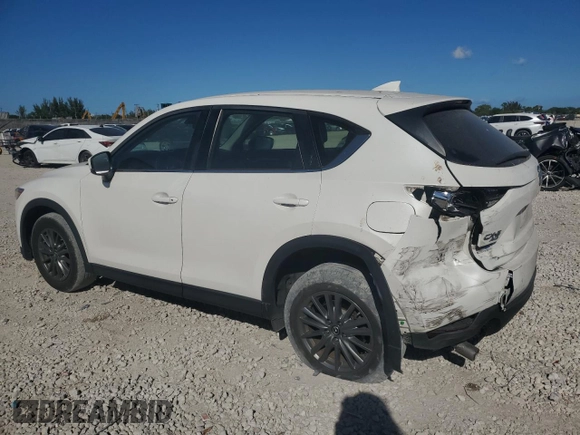 2018 Mazda CX-5 Sport with VIN JM3KFBBMXJ0309289, listed as a Copart auction lot 48866565 with 64,040 mi miles and Salvage Title. Bid and sale history available at carsss.com. Image 2.