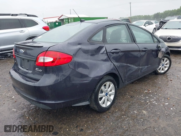2012 Ford Fiesta SE z VIN 3FADP4BJ4CM155538, wystawiony jako IAAI lot #42352703 z przebiegiem 100 666 mil mil oraz . Historia ofert i sprzedaży dostępna na DreamBid. Obrazek 4.