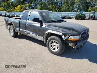 2003 Dodge Dakota SLT with VIN 1D7HL42X33S284170, listed as a Copart auction lot 76657204 with 146,790 mi miles and Salvage Title. Bid and sale history available at carsss.com. Image 4.