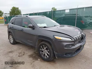 2016 Jeep Cherokee Latitude z VIN 1C4PJMCB1GW340555, wystawiony jako IAAI lot #42524488 z przebiegiem 126 632 mil mil oraz . Historia ofert i sprzedaży dostępna na DreamBid. Obrazek 1.