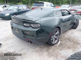2020 Chevrolet Camaro 1LT with VIN 1G1FB1RS6L0125323, listed as a IAAI auction lot 42101034 with 124,474 mi miles and . Bid and sale history available at DreamBid. Image 4.