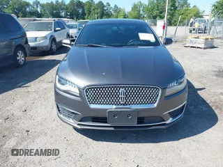 2017 Lincoln MKZ Reserve z VIN 3LN6L5E98HR653592, wystawiony jako IAAI lot #42531248 z przebiegiem 114 188 mil mil oraz . Historia ofert i sprzedaży dostępna na DreamBid. Obrazek 12.