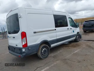 2015 Ford Transit Cargo with VIN 1FTNR2CMXFKA83472, listed as a IAAI auction lot 42212853 with 88,182 mi miles and . Bid and sale history available at DreamBid. Image 4.