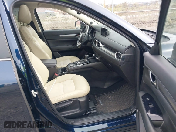 2019 Mazda CX-5 Touring with VIN JM3KFBCM5K0689948, listed as a IAAI auction lot 41976266 with 74,812 mi miles. Bid and sale history available at carsss.com. Image 5.