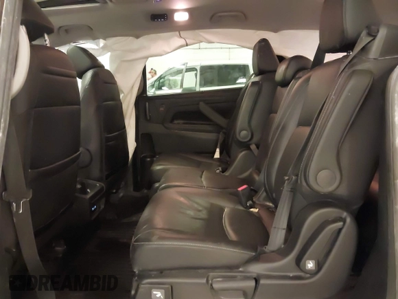 2021 Honda Odyssey Touring with VIN 5FNRL6H82MB025923, listed as a IAAI auction lot 42104290 with 61,178 mi miles and . Bid and sale history available at DreamBid. Image 8.