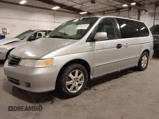 2004 Honda Odyssey EX-L with VIN 5FNRL18974B127696, listed as a IAAI auction lot 41643243 with 200,286 mi miles and . Bid and sale history available at DreamBid. Image 22.