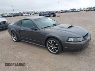 2004 Ford Mustang GT Deluxe z VIN 1FAFP42X74F115520, wystawiony jako IAAI lot #41842751 z przebiegiem 179 665 mil mil oraz . Historia ofert i sprzedaży dostępna na DreamBid. Obrazek 1.