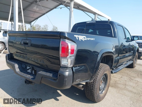 2022 Toyota Tacoma SR5 with VIN 3TMBZ5DN6NM034630, listed as a IAAI auction lot 42733932 with 43,309 mi miles and . Bid and sale history available at DreamBid. Image 4.