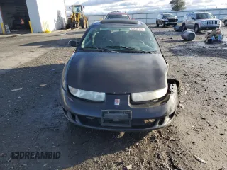 2000 Saturn SC with VIN 1G8ZY1273YZ152453, listed as a Copart auction lot 84834784 with Not Provided miles and Salvage Title. Bid and sale history available at carsss.com. Image 5.