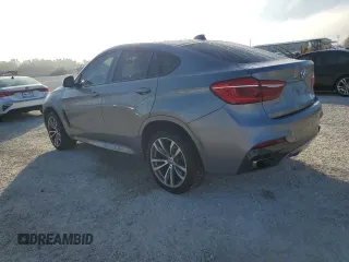 2015 BMW X6 xDrive35i with VIN 5UXKU2C58F0F96503, listed as a Copart auction lot 70099462 with 77,940 mi miles. Bid and sale history available at carsss.com. Image 2.