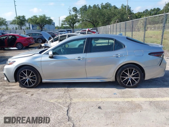 2023 Toyota Camry SE with VIN 4T1G11AK5PU750719, listed as a IAAI auction lot 42133210 with 55,688 mi miles. Bid and sale history available at carsss.com. Image 14.