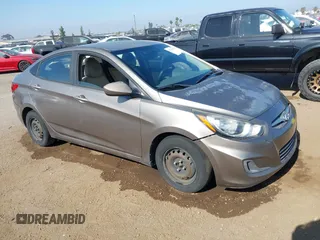 2014 Hyundai Accent GLS z VIN KMHCT4AE9EU600615, wystawiony jako IAAI lot #42520194 z przebiegiem 122 634 mil mil oraz . Historia ofert i sprzedaży dostępna na DreamBid. Obrazek 1.