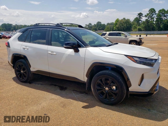 2023 Toyota RAV4 Hybrid XSE with VIN 2T3E6RFV5PW043640, listed as a Copart auction lot 64097125 with 13,686 mi miles and Salvage title. Bid and sale history available at DreamBid. Image 4.