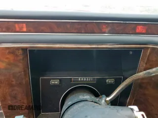 1990 Cadillac Brougham z VIN 1G6DW5473LR712137, wystawiony jako Copart lot #57914885 z przebiegiem Nie podano mil oraz Tytuł czysty. Historia ofert i sprzedaży dostępna na DreamBid. Obrazek 9.