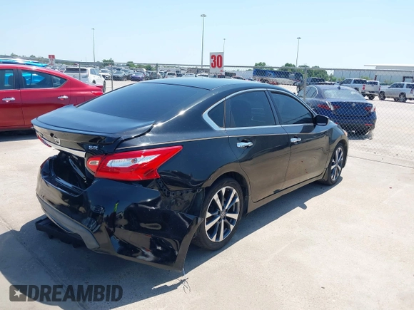 2016 Nissan Altima SR with VIN 1N4AL3AP9GC280265, listed as a IAAI auction lot 41982085 with 162,250 mi miles and . Bid and sale history available at carsss.com. Image 4.