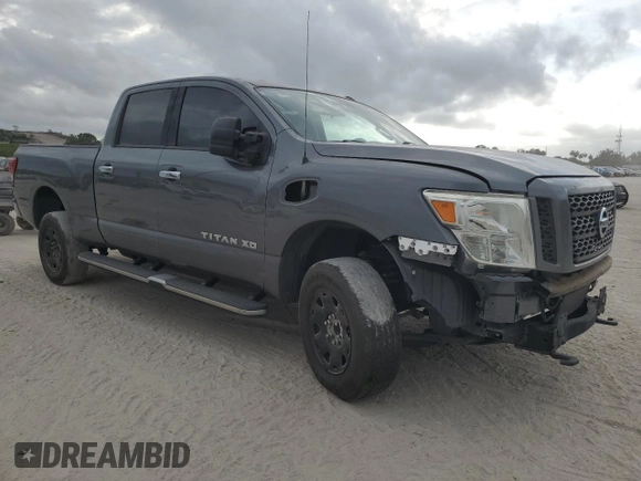 2016 Nissan Titan S with VIN 1N6BA1F14GN517646, listed as a Copart auction lot 55381575 with 147,654 mi miles and Salvage title. Bid and sale history available at DreamBid. Image 4.