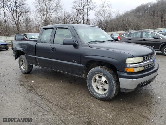 2002 Chevrolet Silverado 1500 LS with VIN 2GCEK19V021371008, listed as a Copart auction lot 46920055 with 153,594 mi miles and Salvage Title. Bid and sale history available at carsss.com. Image 4.