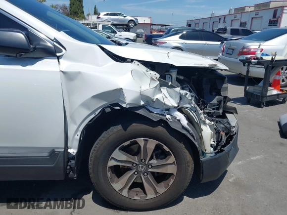 2019 Honda CR-V LX with VIN 2HKRW5H33KH407463, listed as a IAAI auction lot 42034584 with 85,454 mi miles and . Bid and sale history available at DreamBid. Image 6.