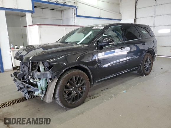 2015 Dodge Durango R/T with VIN 1C4SDJCTXFC817802, listed as a Copart auction lot 61962865 with 146,826 mi miles and Salvage title. Bid and sale history available at DreamBid. Image 1.