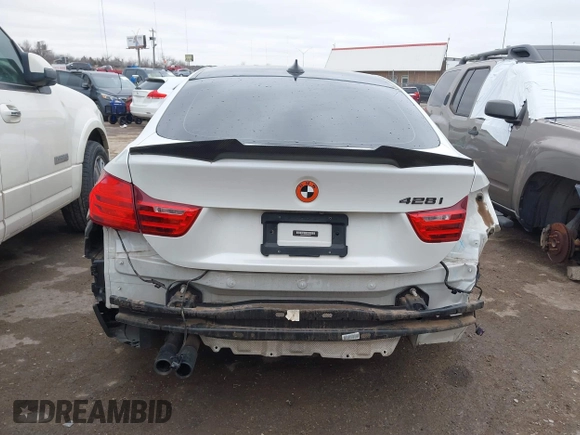 2016 BMW 4 Series 428i with VIN WBA4A9C5XGG506931, listed as a IAAI auction lot 41539868 with 91,292 mi miles. Bid and sale history available at carsss.com. Image 17.