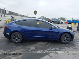 2023 Tesla Model 3 z VIN 5YJ3E1EA0PF481160, wystawiony jako IAAI lot #42704086 z przebiegiem 23 308 mil mil oraz . Historia ofert i sprzedaży dostępna na DreamBid. Obrazek 13.