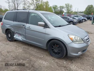 2006 Honda Odyssey Touring z VIN 5FNRL38806B100880, wystawiony jako IAAI lot #42173197 z przebiegiem 159 413 mil mil oraz . Historia ofert i sprzedaży dostępna na DreamBid. Obrazek 1.